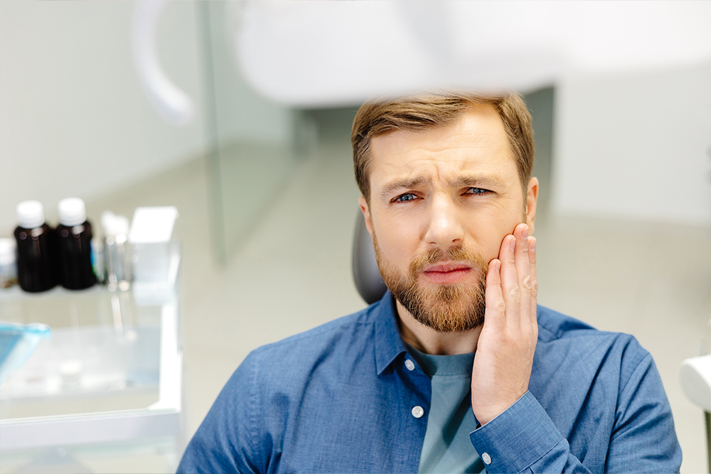 Emergency Dentist in Woodbridge at Napa Dental providing urgent care for a patient experiencing severe tooth pain